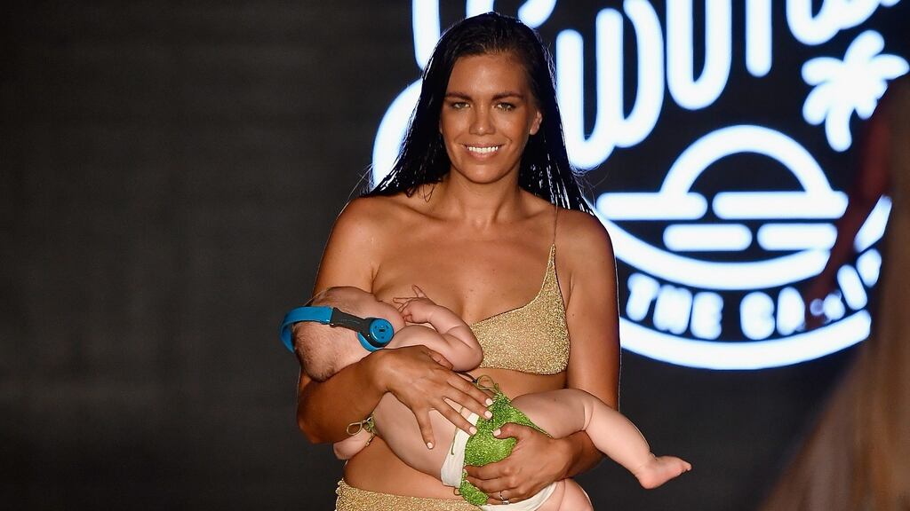A model breastfeeds while walking the runway for the 2018 Sports Illustrated Swimsuit show in Miami, Florida. Photograph: Frazer Harrison/Getty Images