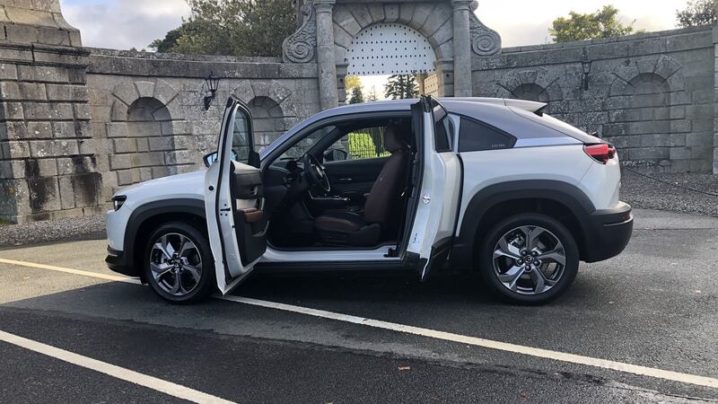 The MX-30 is a chunky, four-seat crossover with coupe-ish styling and cool rear-hinged doors meant to remind us of the old RX-8 sports car