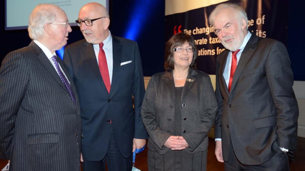 Brendan Halligan, chairman of the IIEA, Heinz Zourek, director general of Taxation and Customs Union at the European Commission, Josephine Feehily, chairwoman of the Revenue Commissioners, and Tom Arnold , director general of the IIEA, at the IIEA Corporate Taxation Conference. Photograph: Eric Luke