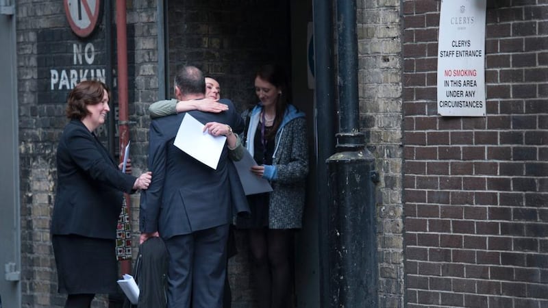 Staff leaving Clery’s by the back-door tonight. Photograph: Dave Meehan