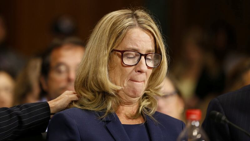 Christine Blasey Ford reacts as she speaks before the Senate Judiciary Committee hearing on the nomination of Brett Kavanaugh to be an associate justice of the Supreme Court of the United States, on Capitol Hill. Photograph: Michael Reynolds/Reuters/Pool