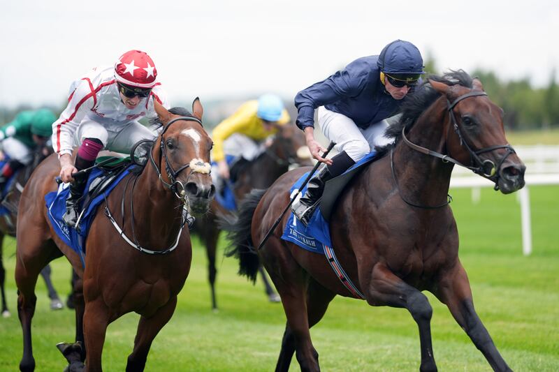 Treasure Isle (right) ridden by jockey Ryan Moore on the way to winning the Qatar Racing And Equestrian Club Irish EBF Juvenile Sprint Stakes at the Curragh on August 17th, 2024. Photograph: Niall Carson/PA Wire.