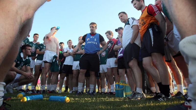 Kieran McGeeney talks to his Kildare players after what turned out to be his final match as manager – the defeat to Tyrone in the qualifiers. Photograph: Donall Farmer/Inpho.