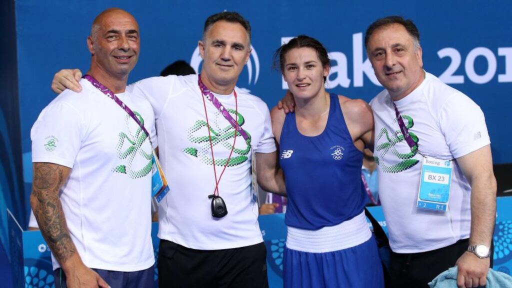 Katie Taylor celebrates her gold medal win in the European Games in Baku with her coaches Pete Taylor, Zaur Anita and Billy Walsh. Photograph: Ryan Byrne/INPHO