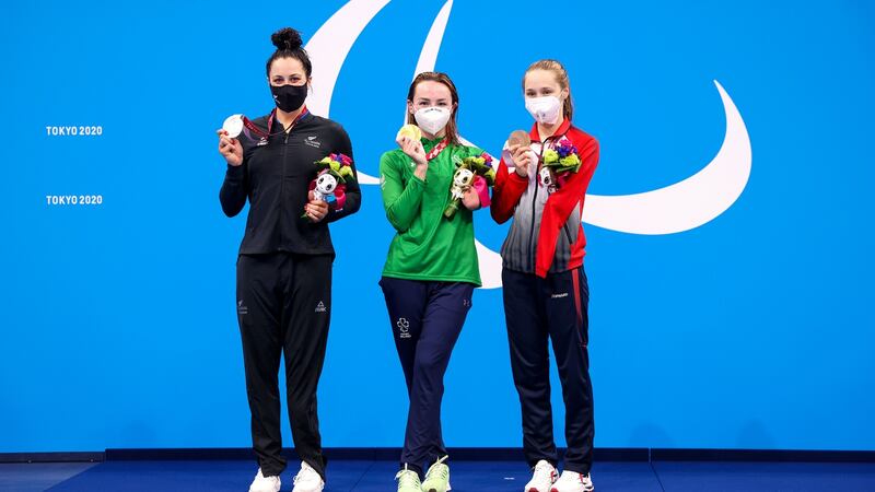 Gold medal winner Ellen Keane between silver medalist Sophie Pascoe from New Zealand (L) and Russian bronze medalist Adelina Razetdinova. Photograph: Tommy Dickson/Inpho