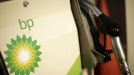 BP posts slump in Russian income, raises dividend