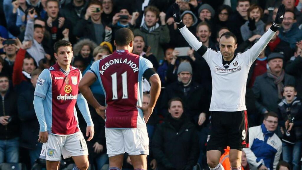 Fulham’s Dimitar Berbatov celebrates his penalty against Aston Villa. Photograph: Stefan Wermuth/Reuters