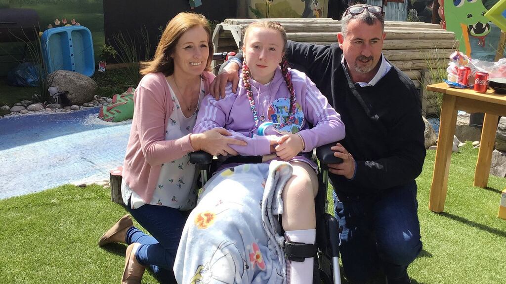 Amy Mulcahy and her parents Sharon and Mark.