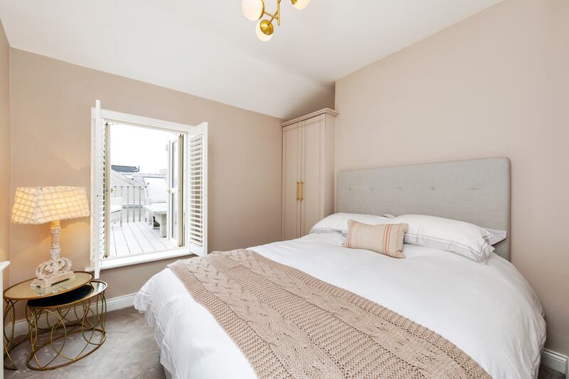 Access to the rooftop terrrace is via French doors upstairs.