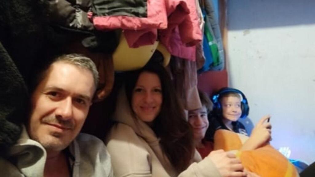 Eugeniy Arsentiev; his wife, Yevheniia; and their children, Nikita (16) and Kyrill (6), sheltering in the windowless rooms of their Mariupol apartment during the early days of Russia’s invasion