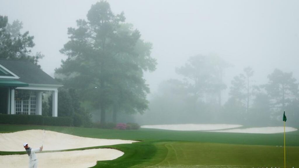 Rory McIlroy hits a shot from a bunker during a practice round yesterday prior to the start of the US Masters at Augusta National Golf Club in Georgia. Photograph: Andrew Redington/Getty Images