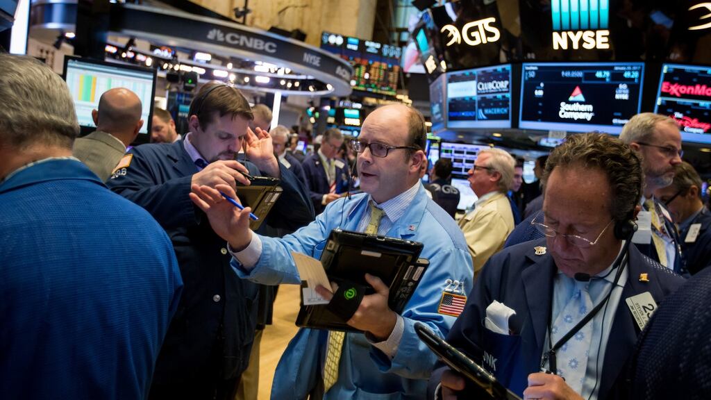 Traders work on the floor of the New York Stock Exchange. Photograph: Michael Nagle/Bloomberg
