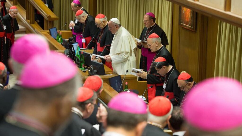 Synod: Pope Francis (C) leading the extraordinary Synod of bishops on family, at the Vatican. Catholic bishops were coming together for a two-week synod in order to discuss church stances on family-related issues such as marriage, divorce, homosexuality, contraceptives and premarital sex. Photograph: L’Osservatore Romano/Handout/EPA