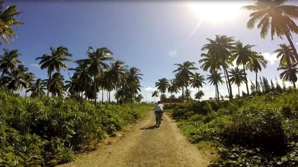 ‘What I love most about living in Aitutaki is that my name is sung from all corners of the island, as I cycle along on my lime green bicycle’