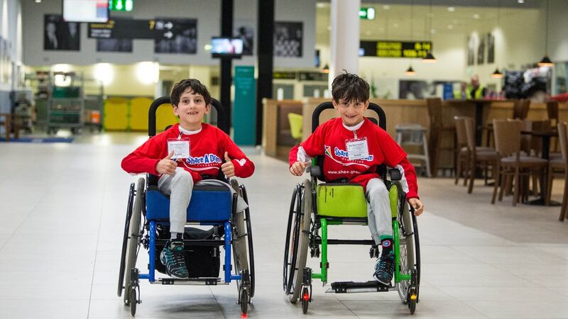 Hassan and Hussein Benhaffaf having a dream day behind the scenes at Shannon airport. Photograph: Diarmuid Greene