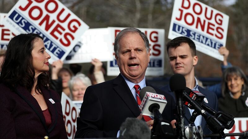 Democratic senatorial candidate Doug Jones speaks to reporters after voting at Brookwood Baptist Church in Mountain Brook, Alabama. Photograph: Justin Sullivan/Getty Images