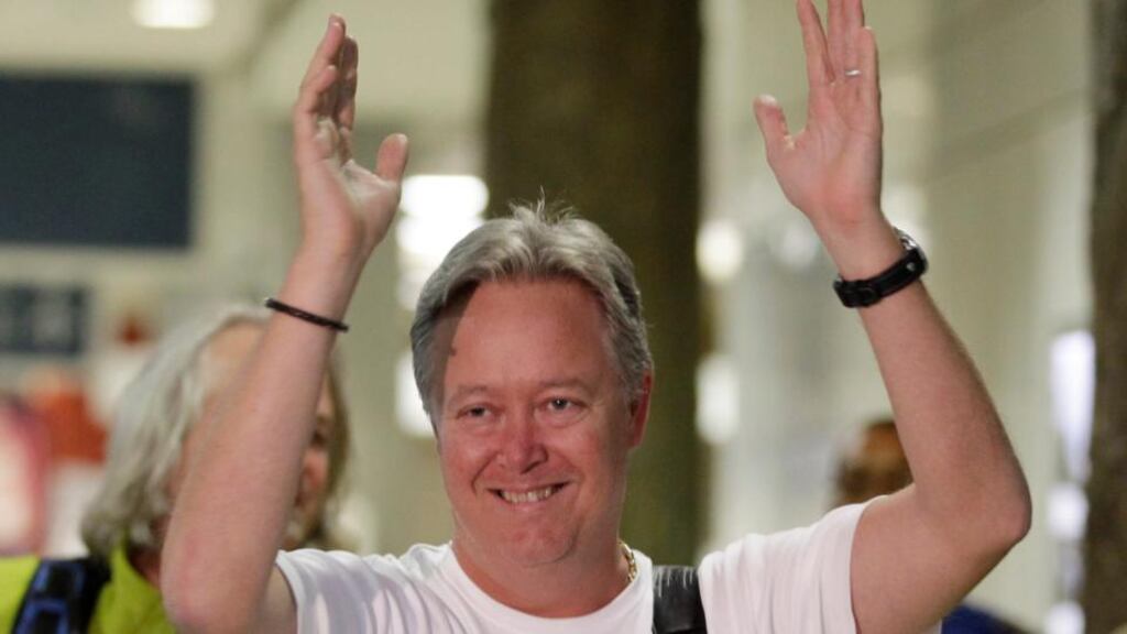 Chip Starnes arrives home in Florida after his hostage ordeal in Beijing