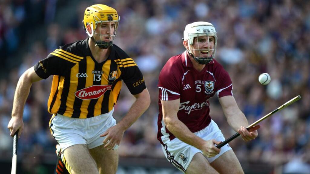 Niall Donohue is chased by Kilkenny’s Colin Fennelly at the 2012 All Ireland Senior Hurling final at Croke Park. Photographer: Dara Mac Dónaill/The Irish Times