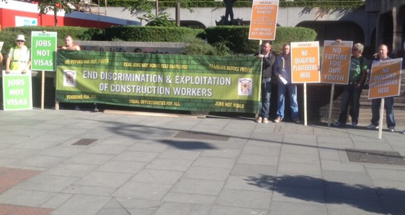 Members of the plasterers’ union Opatsi protest at a building site in Dublin today. Photograph: Opatsi