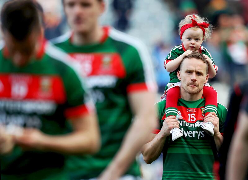 Mayo's Andy Moran with his daughter Charlotte after losing All-Ireland final in 2017. Photograph: Tommy Dickson/Inpho