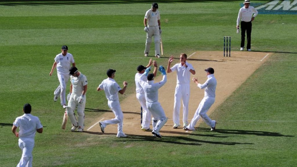 England’s Stuart Broad (second right) celebrates taking the wicket of New Zealand's Hamish Rutherford during day three of the third Test match at Eden Park in Auckland. Photograph: Anthony Devlin/PA