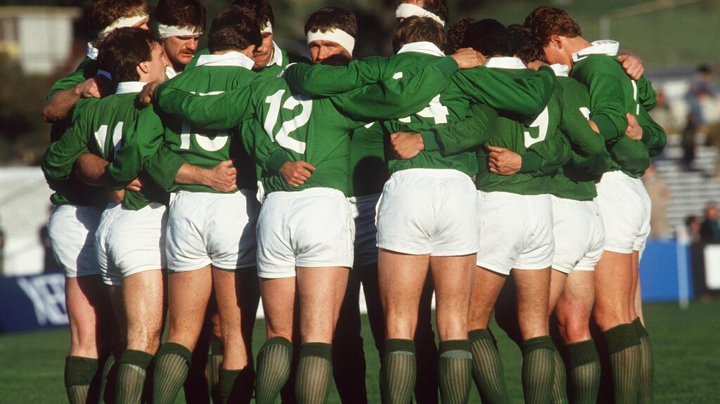 The Ireland team huddle as they listen to the Rose of Tralee in 1987. Photograph: Inpho/Billy Stickland