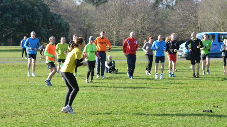 Mary Jennings leads runners in a warm-up before the St Anne’s parkrun last Saturday where more than 250 people enjoyed a run in the sun. Photograph: Alan Betson