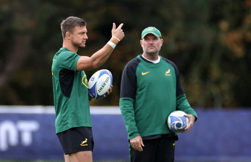 Handre Pollard talks to head coach Jacques Nienaber. Photograph: David Rogers/Getty