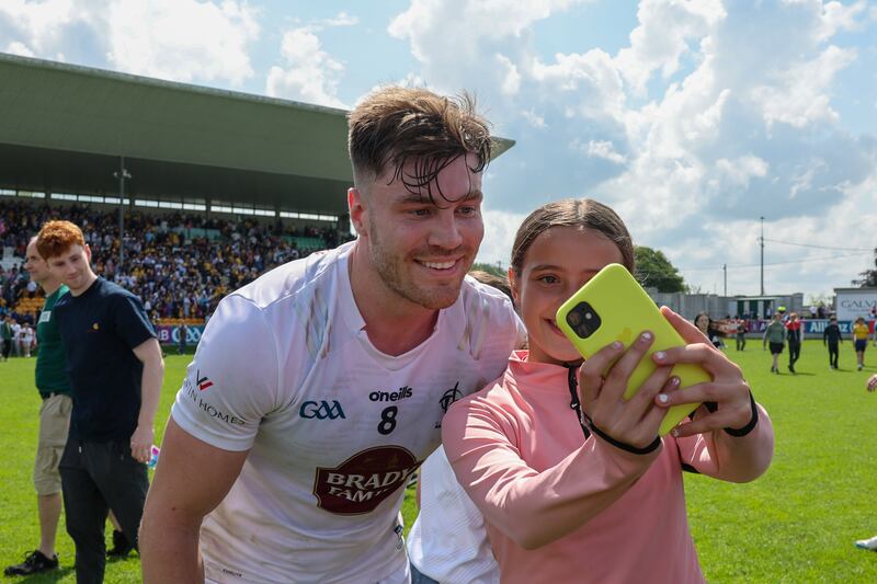 Kevin O'Callaghan takes a selfie with a supporter after Kildare's win over Roscommon at O'Connor Park. Photograph: Paul Dargan/Inpho