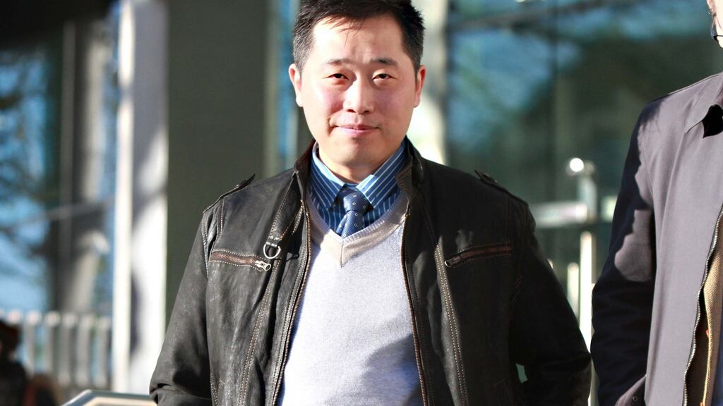 Zhen Dong Zhao of Jervis Street Dublin pictured leaving the Central Criminal Court in 2012. File photograph: Collins