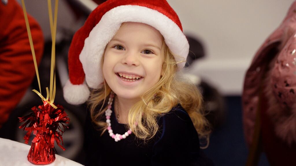 Evelyn Denisa Yudytha, (5) at the Knights of Columbanus Christmas dinner, at the RDS in Dublin on Christmas day. Photograph: Dara Mac Dónaill