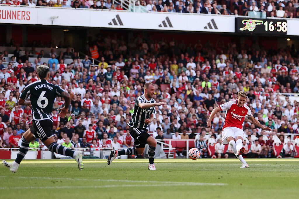 Martin Odegaard scores for Arsenal against Manchester United during their Premier League clash at the Emirates Stadium. Photograph: Michael Steele/Getty Images