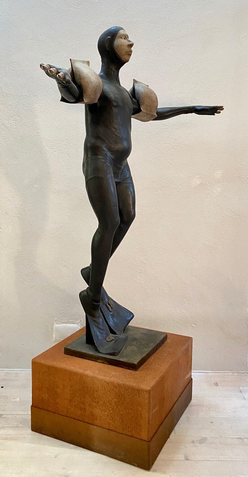 Wetsuit and Wings by Michael Quane, a full-size bronze on a steel plinth, is on show at the Modern Irish Sculpture exhibition in the Butter Market in Kenmare.