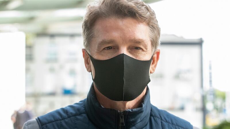 Former Ireland rugby international Brendan Mullin leaving Dublin District Court on Tuesday after he was charged with theft, deception and false accounting. Photograph: Collins Courts