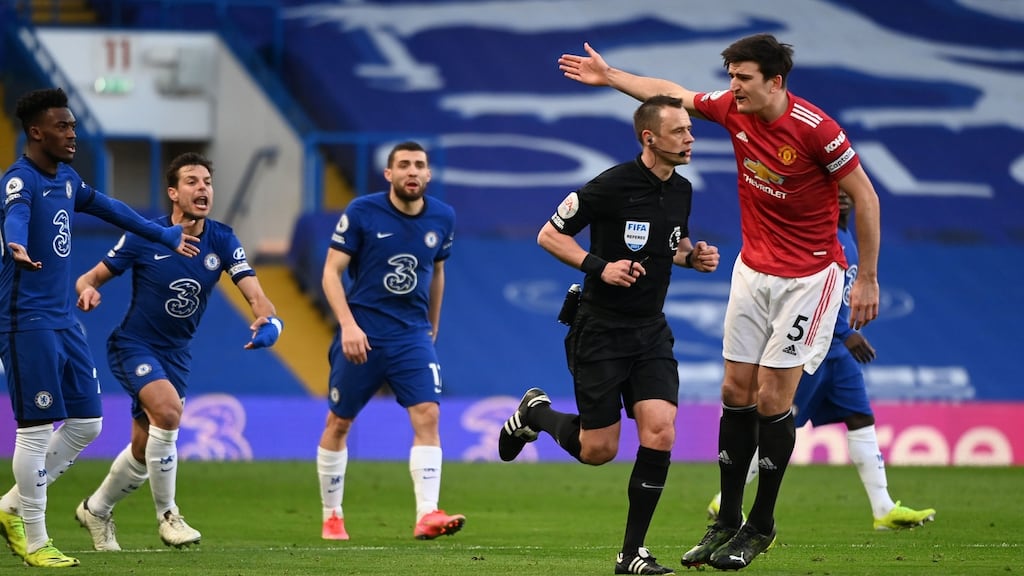 Manchester United’s Harry Maguire remonstrates with referee Stuart Attwell after his decision not to award a penalty against Chelsea following a VAR check of an incident at Stamford Bridge. Photograph: Andy Rain/PA