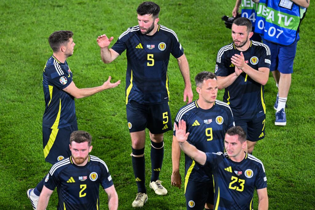 Scotland's players leave the pitch at the end of the UEFA Euro 2024 Group A football match between Scotland and Switzerland at the Cologne Stadium in Cologne. Photograph: Kirill Kudryavtsev/AFP via Getty Images