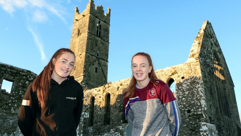 Photograph for Keith Duggan feature. Twin sisters Emma (left) and Kate Slevin on the grounds of Claregalway Friary. Photograph: Joe O Shaughnessy. 29 November 2021