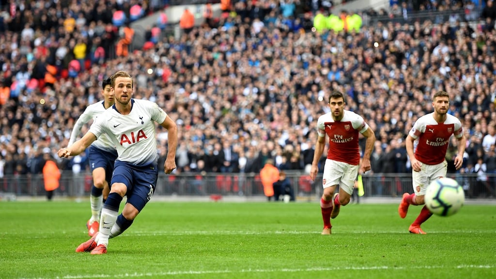 Harry Kane scores Tottenham’s equaliser from the spot. Photograph: Michael Regan/Getty
