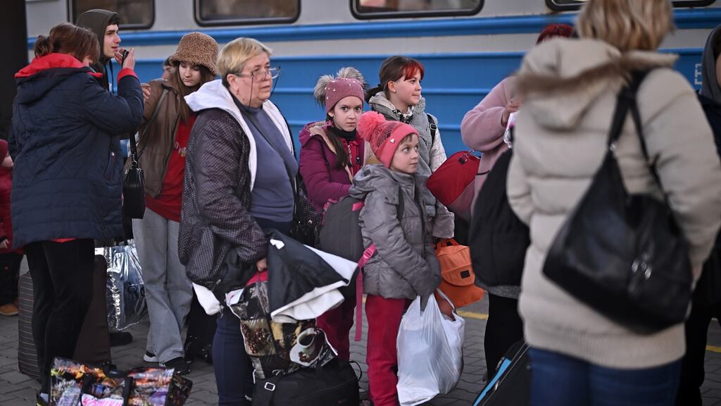 People, mainly women and children, arrive at Przemysl station in Poland after a train journey from war-torn Ukraine. Photograph: Jeff J Mitchell/Getty Images