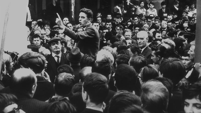 A young Austin Currie addresses the crowd at the Duke Street civil rights demonstration in Derry in 1968, with former Nationalist leader Eddie McAteer to his right. Photograph: Trevor McBride