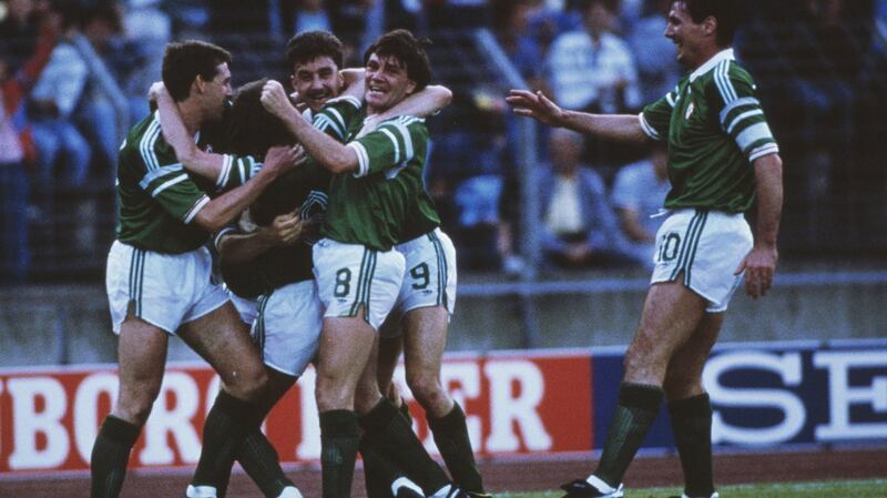 Ronnie Whelan is mobbed by Republic of Ireland team-mates after scoring a superb goal against the USSR during the European Championship clash in Hannover in 1988. Photograph: Billy Stickland/Allsport/Getty Images