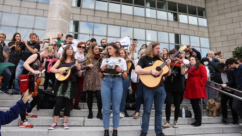 Musicians play on the steps of the Dublin City Council offices in protest at the plans for a hotel beside the Cobblestone pub. Photograph: Dara Mac Dónaill