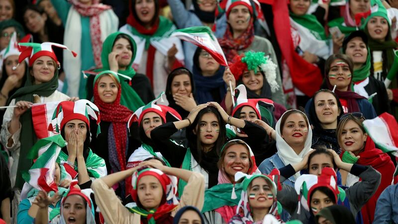 Fans react in the women’s section during the World Cup qualifier between Iran and Cambodia at the Azadi stadium in Tehran. Photograph: Amin M Jamali/Getty Images