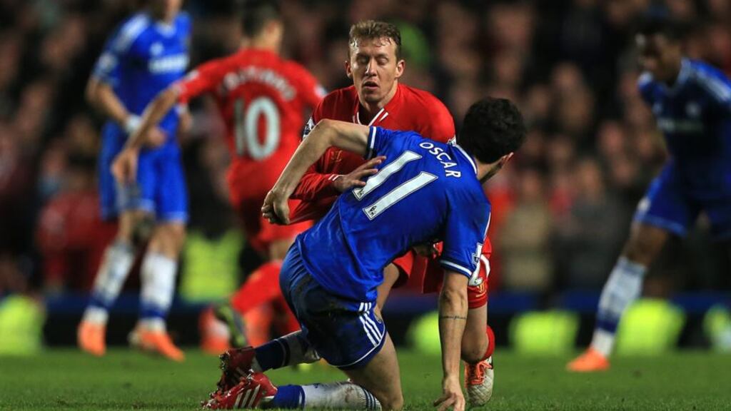 Leiva Lucas and Oscar get into a scrape late in the game at Stamford Bridge. Photograph: Nick Potts/PA Wire.