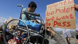 Wheelchair-bound teen sits at shut Macedonian border for hours