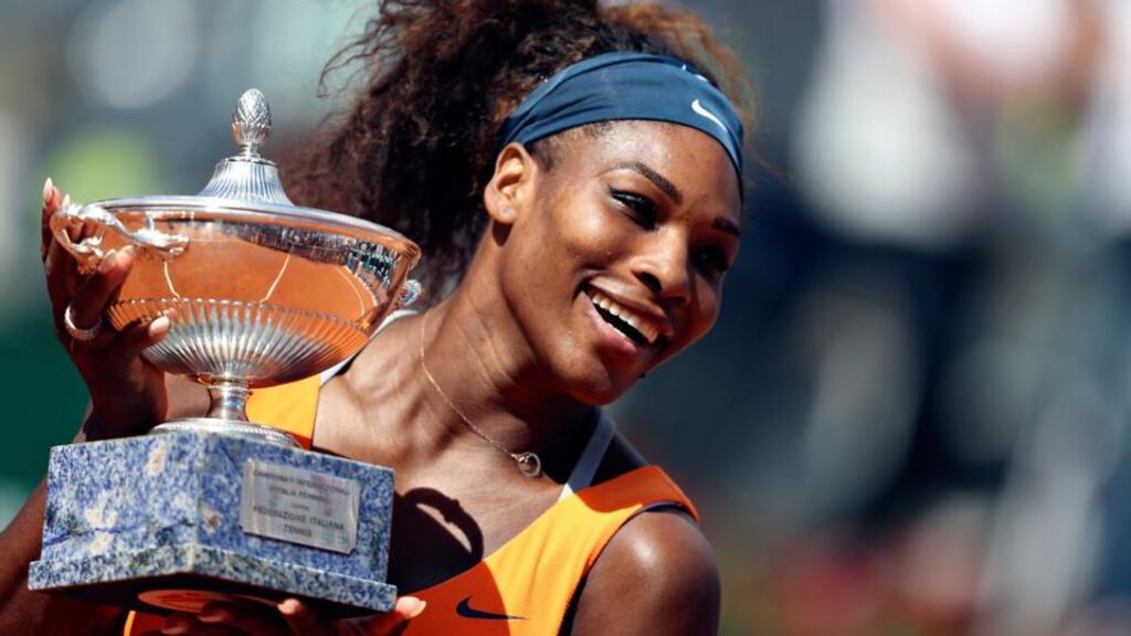 Serena Williams of the US holds the trophy after winning the women’s singles final match against Victoria Azarenka of Belarus at the Rome Masters. Photograph: Alessandro Bianchi/Reuters