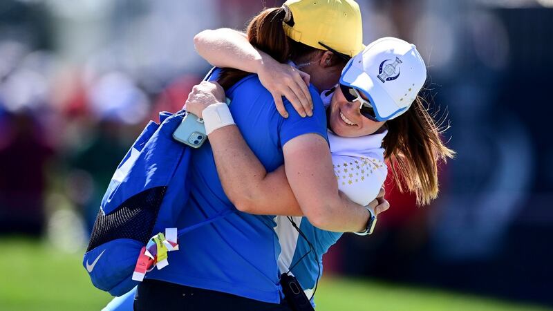 Europe’s Leona Maguire celebrates with her sister Lisa after defeating United States’ Jennifer Kupcho on the 15th hole at the Solheim Cup in Toledo, Ohio. Photograph: David Dermer/AP