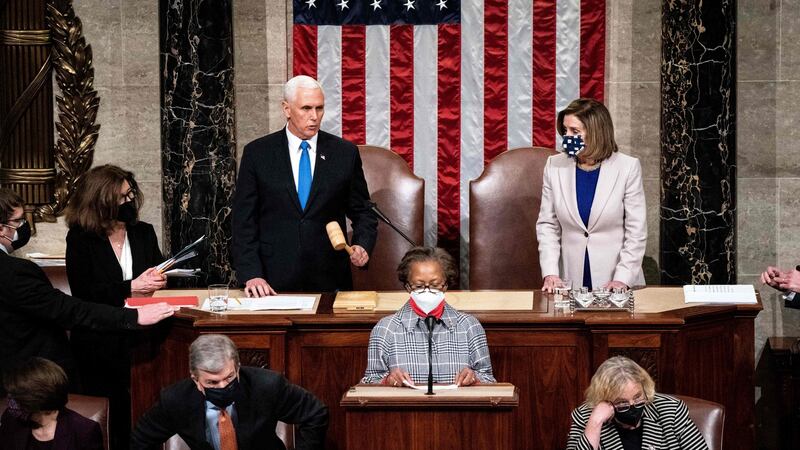 Vice-president Mike Pence and House speaker Nancy Pelosi presiding over a joint session of Congress to certify the electoral college results. Photograph: Erin Schaff/POOL/AFP via Getty Images