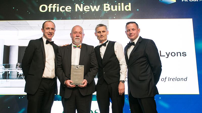 Greg Hayden, MD, Ethos Engineering, presents the Fit Out Project of the Year – Office New Build award to the Central Bank of Ireland Project team