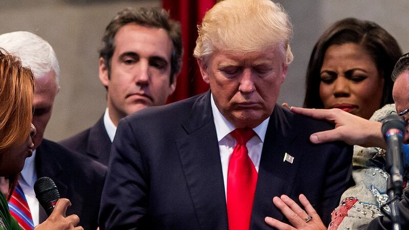 Michael Cohen, pictured behind Donald Trump on the left, at a campaign stop at the New Spirit Revival Center in Cleveland, in 2016. Photograph: Eric Thayer/The New York Times
